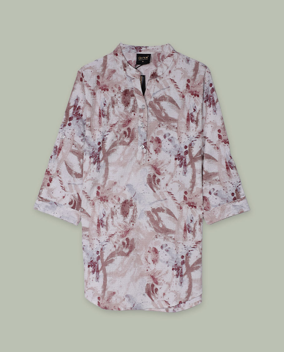 Blush and beige abstract printed tunic top with band collar, half button placket, three-quarter sleeves, and curved hem.