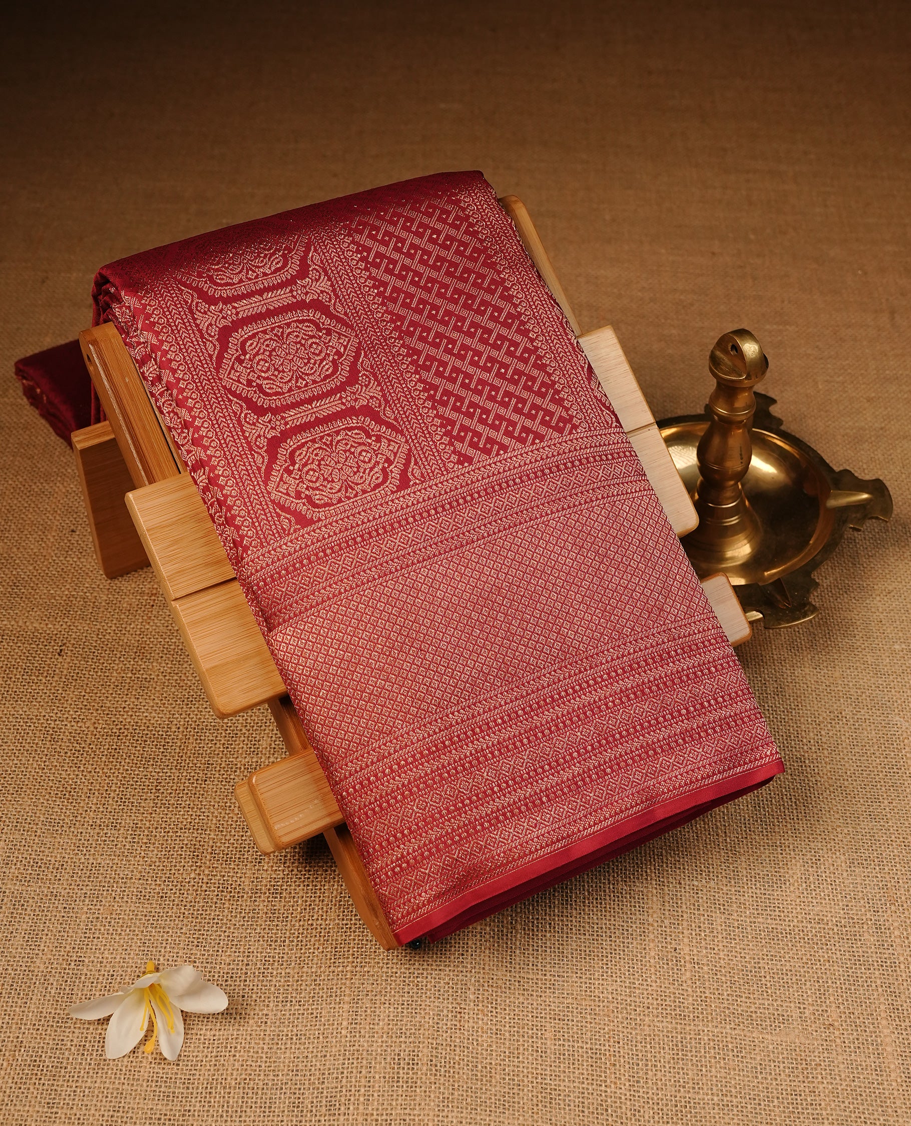Maroon Colour Wedding silk saree Featuring Gold Zari Pattern on Body, Finished with Self colour With Traditional border, Comes with Matching Blouse Piece.