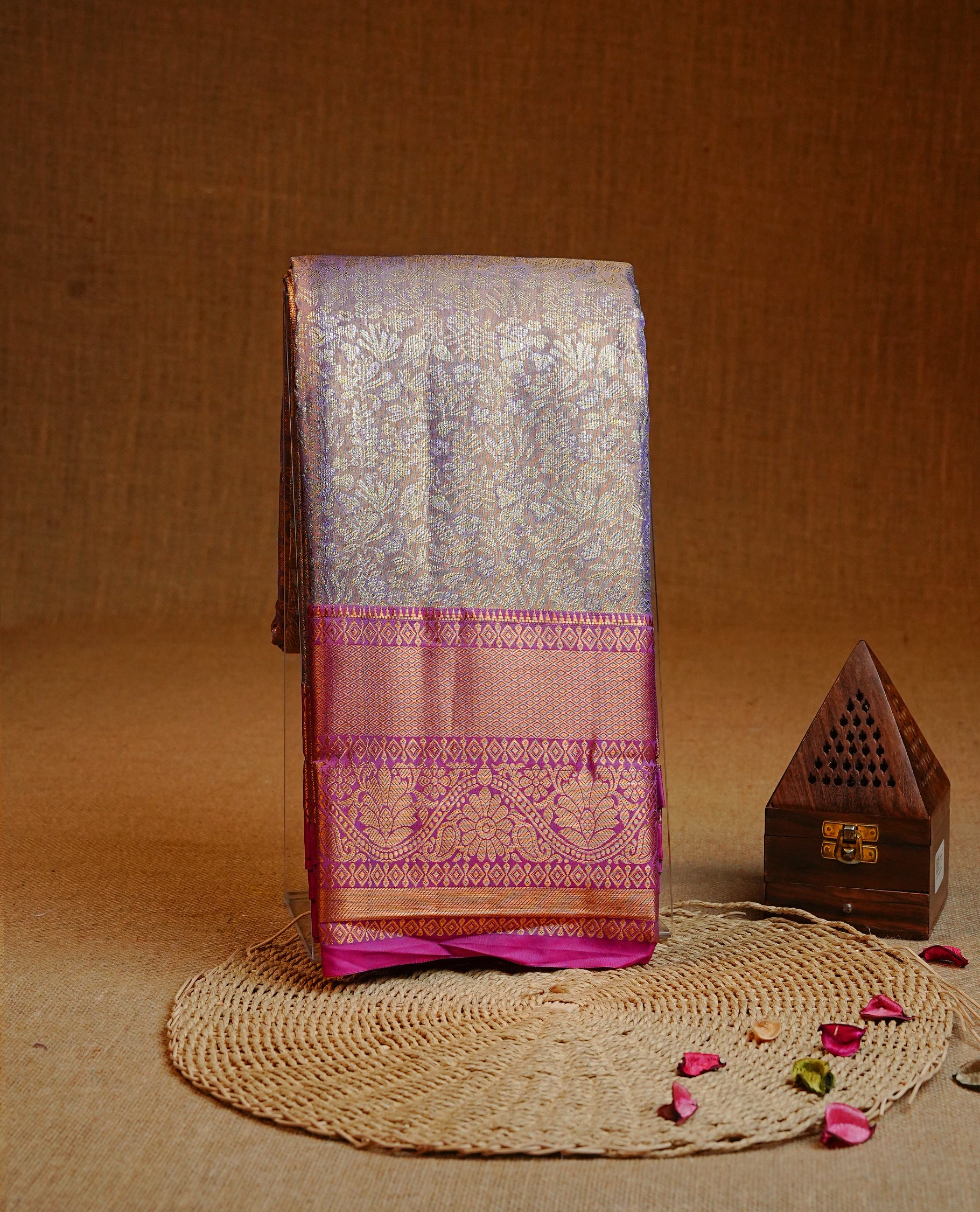 Purple & gold colour Double shade Semi tissue silk saree featuring Gold & silver kodi with Pattern on body, Contrast Magenta colour with traditional border, paired with matching.