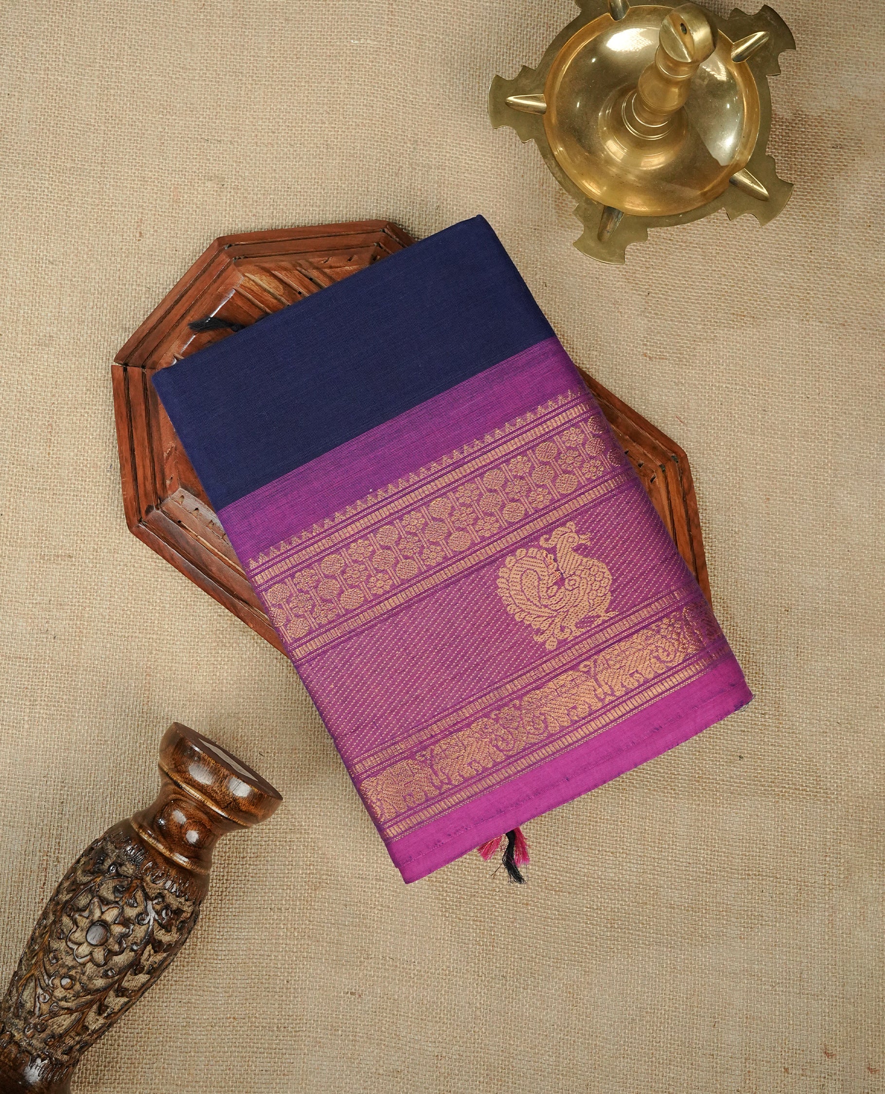 Navy Blue Colour Chettinad Cotton Saree Featuring a Plain Body, Complemented by a Pink Colour with Grand Gold Zari Border & Contrast Striped Pallu, Paired with a Matching Blouse Piece.
