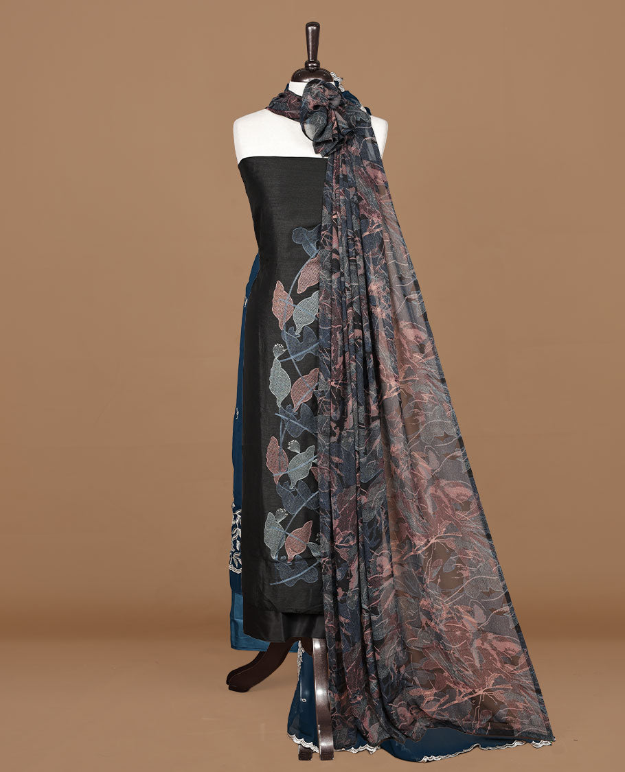 Black colour churidar material featuring thread & sequins Worked pattern on body, comes with matching bottom and dupatta.