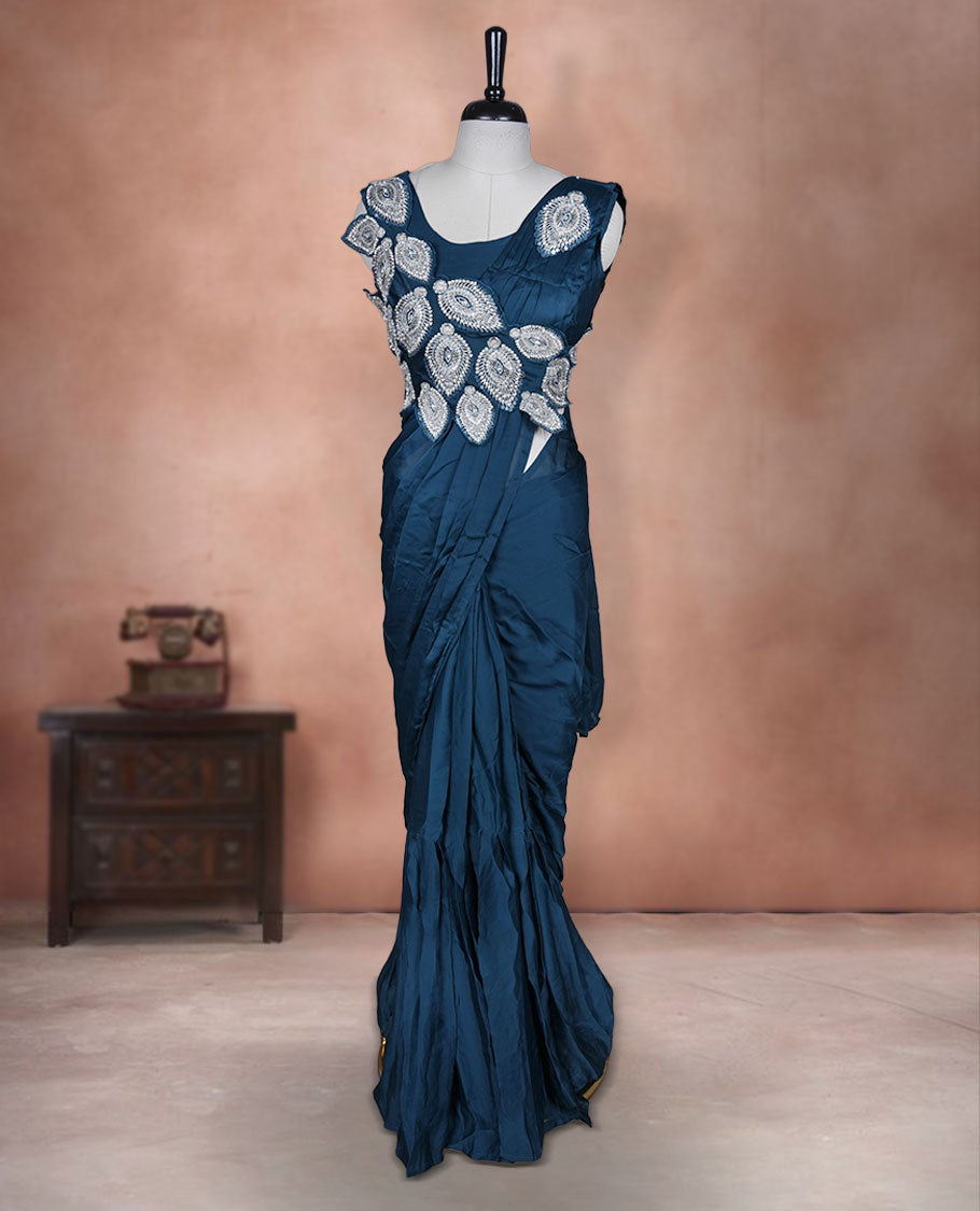 Deep Teal colour ready to wear saree featuring bold silver applique embroidery on the drape, paired with a sculpted matching blouse