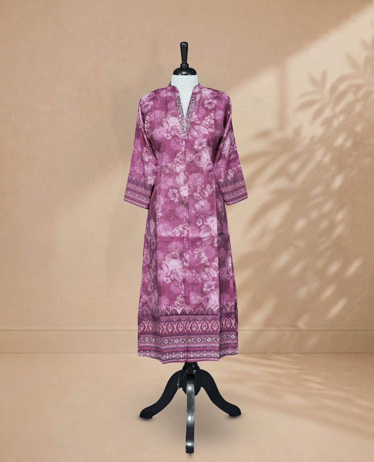 Pink colour Kurti featuring digital floral prints and stonework On Body , a V-shaped neckline And Bead Work On Neck Yoke, 3/4 sleeves Design
