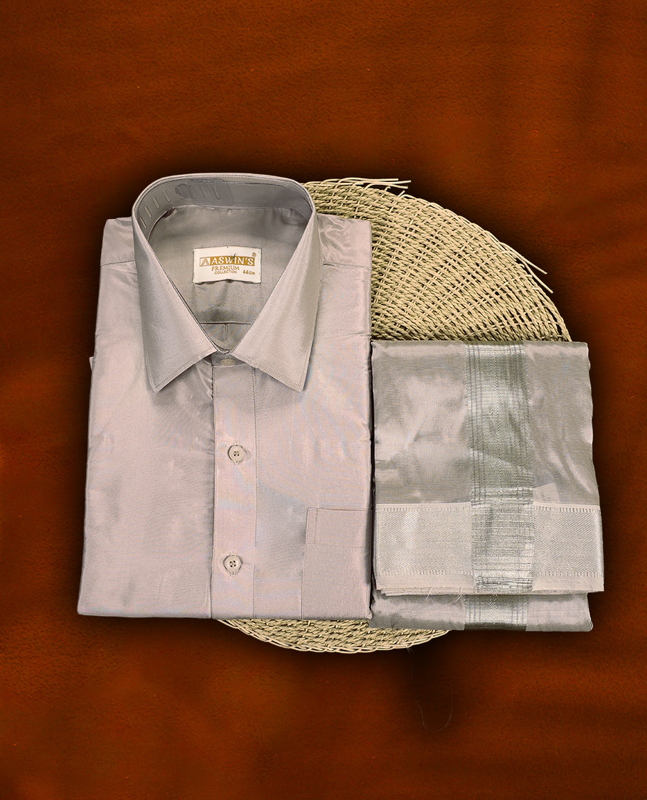 Sand colour Aswin’s wedding set featuring a refined silk shirt and matching dhoti with subtle zari detailing, crafted for timeless elegance and perfect for traditional weddings and festive occasions.