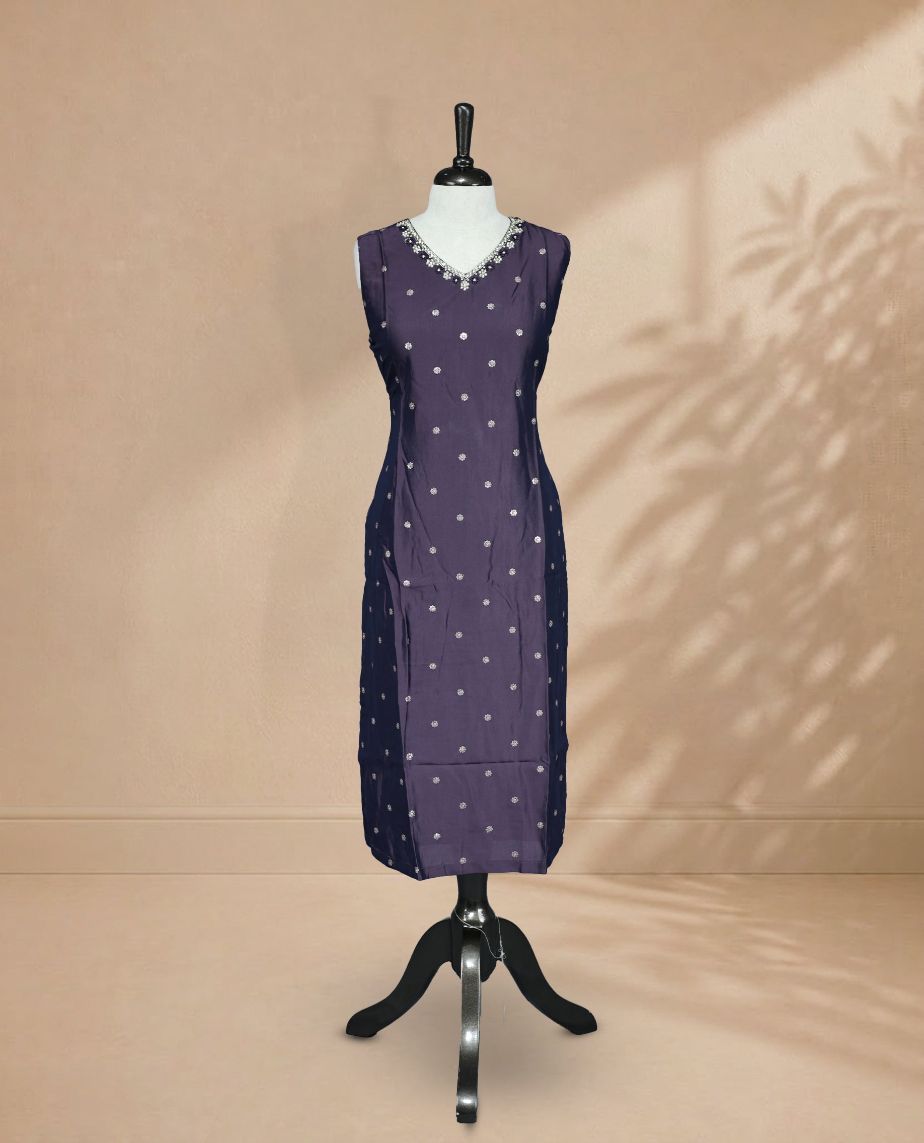 Deep Purple Kurti featuring sequin work on the body, a V-shaped neckline adorned with stone and beadwork, and a sleeveless design.