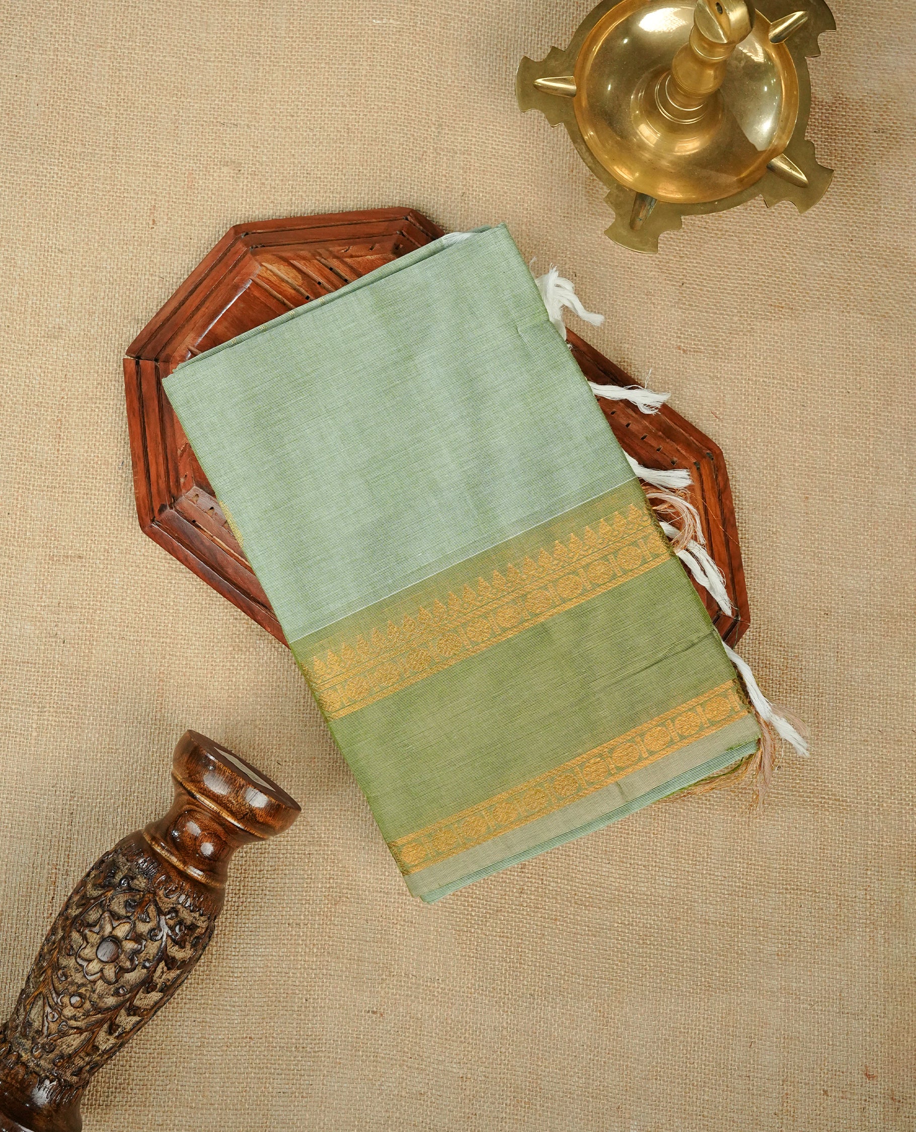 Mint colour chettinad cotton saree Featuring Elegant plain on body, complemented by contrast Olive colour with zari border, comes with matching blouse piece.