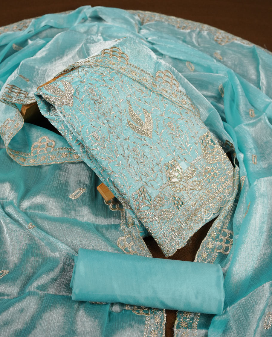 Sky blue colour churidar set with stone and thread embroidery and detailing, paired with matching pant and dupatta.