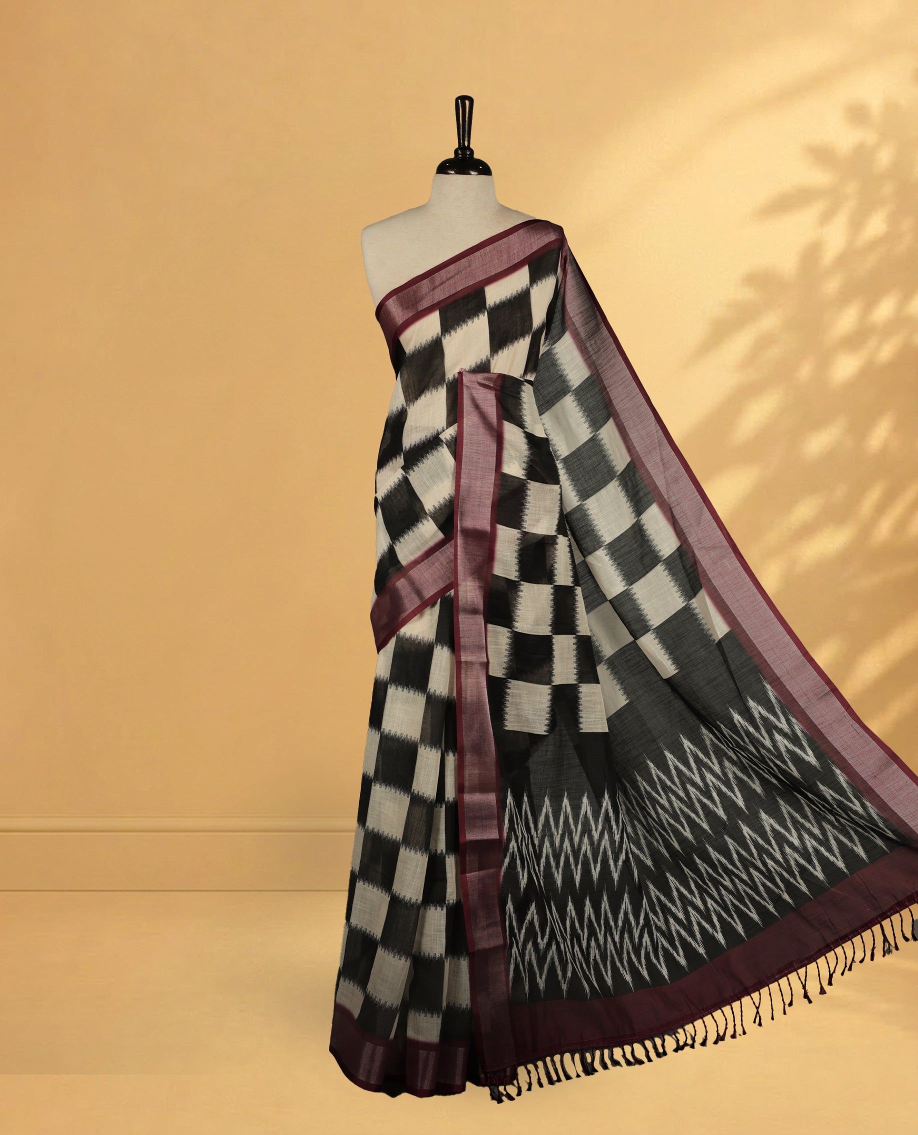 Black & White Colour Semi Linen saree featuring digital printed body, Complemented by Borderless finish, comes with matching blouse piece.