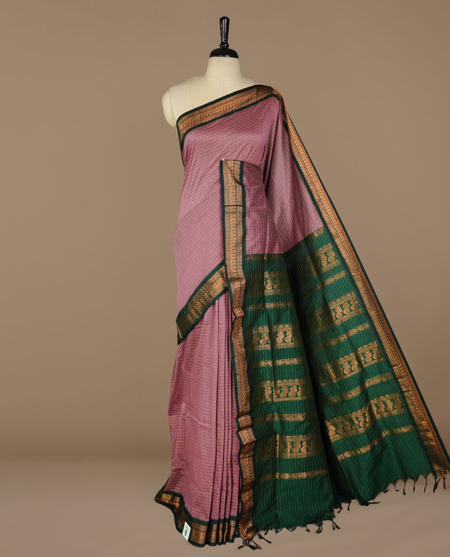 Lavender colour kalyani cotton saree featuring gold zari check pattern on body, complemented by green colour with Antique zari border, paired with matching blouse piece.