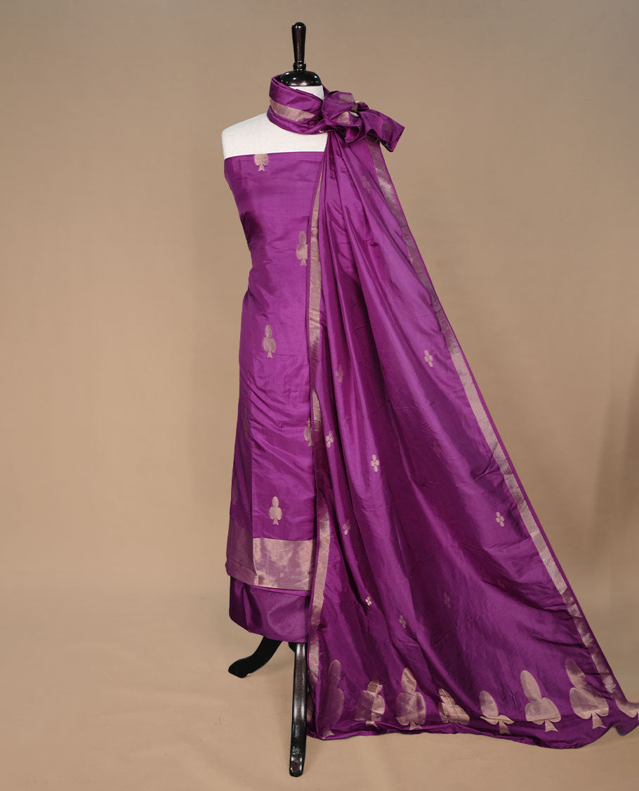 Purple colour churidar materal featuring gold zari card pattern on body, border, paired with matching bottom and dupatta.