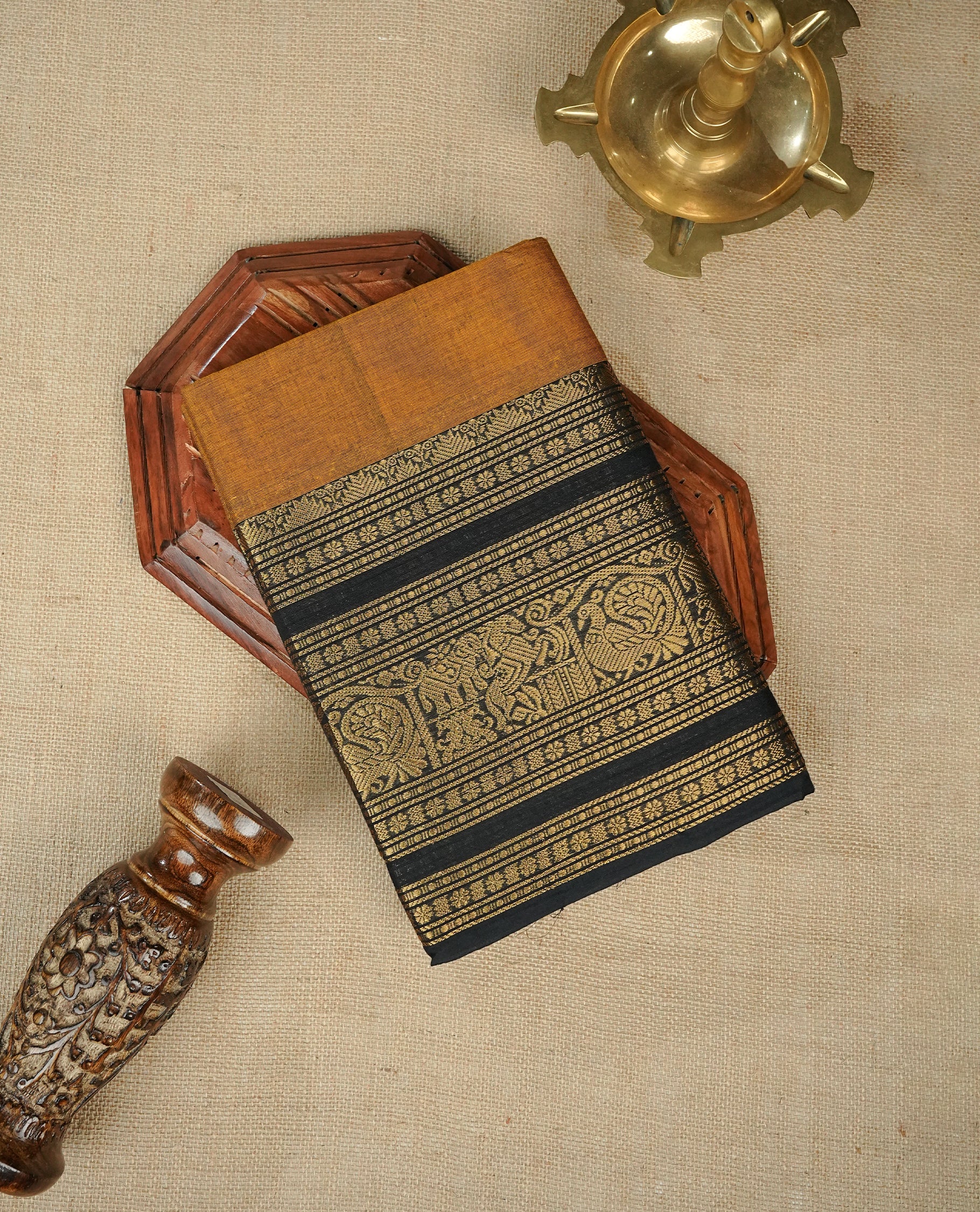 Mustard Yellow Colour Chettinad Cotton Saree Featuring a Plain Body, Complemented by a Black Colour Border with Gold Zari Traditional, Paired with a Matching Blouse Piece.