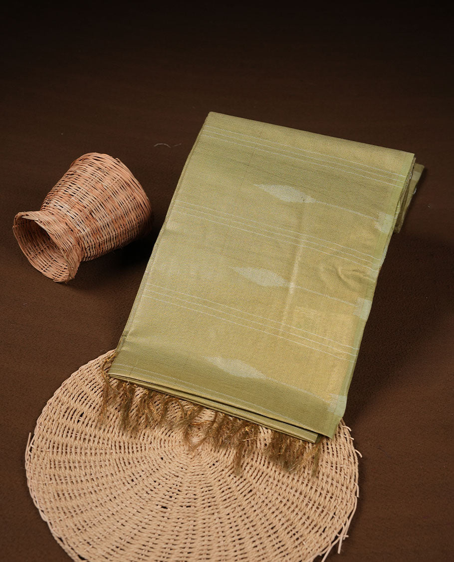 Olive colour semi jute saree highlighting gold zari stripped body with white motifs, without border and paired with matching blouse.
