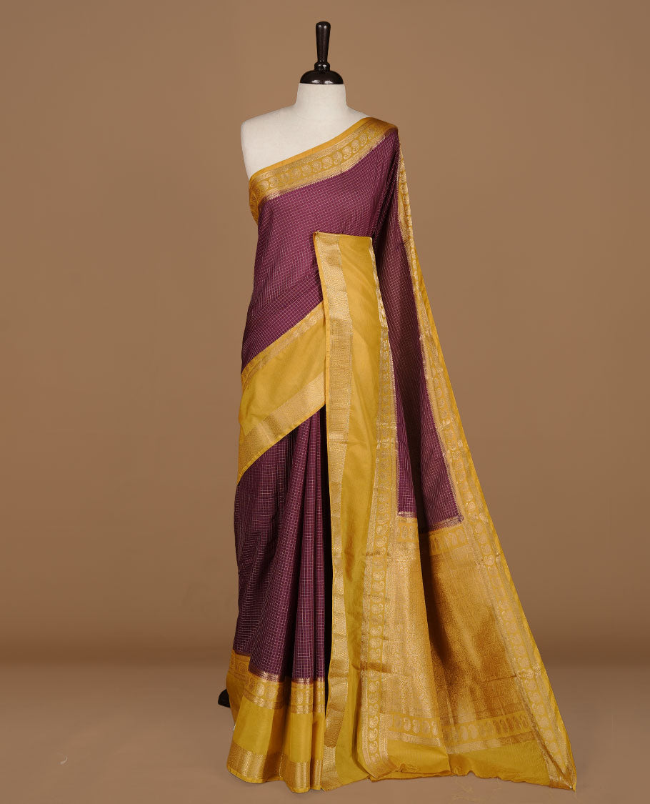 Maroon colour semi georgette saree featuring gold zari check pattern on body, complemented by contrast olive colour with zari border, paired with matching blouse piece.