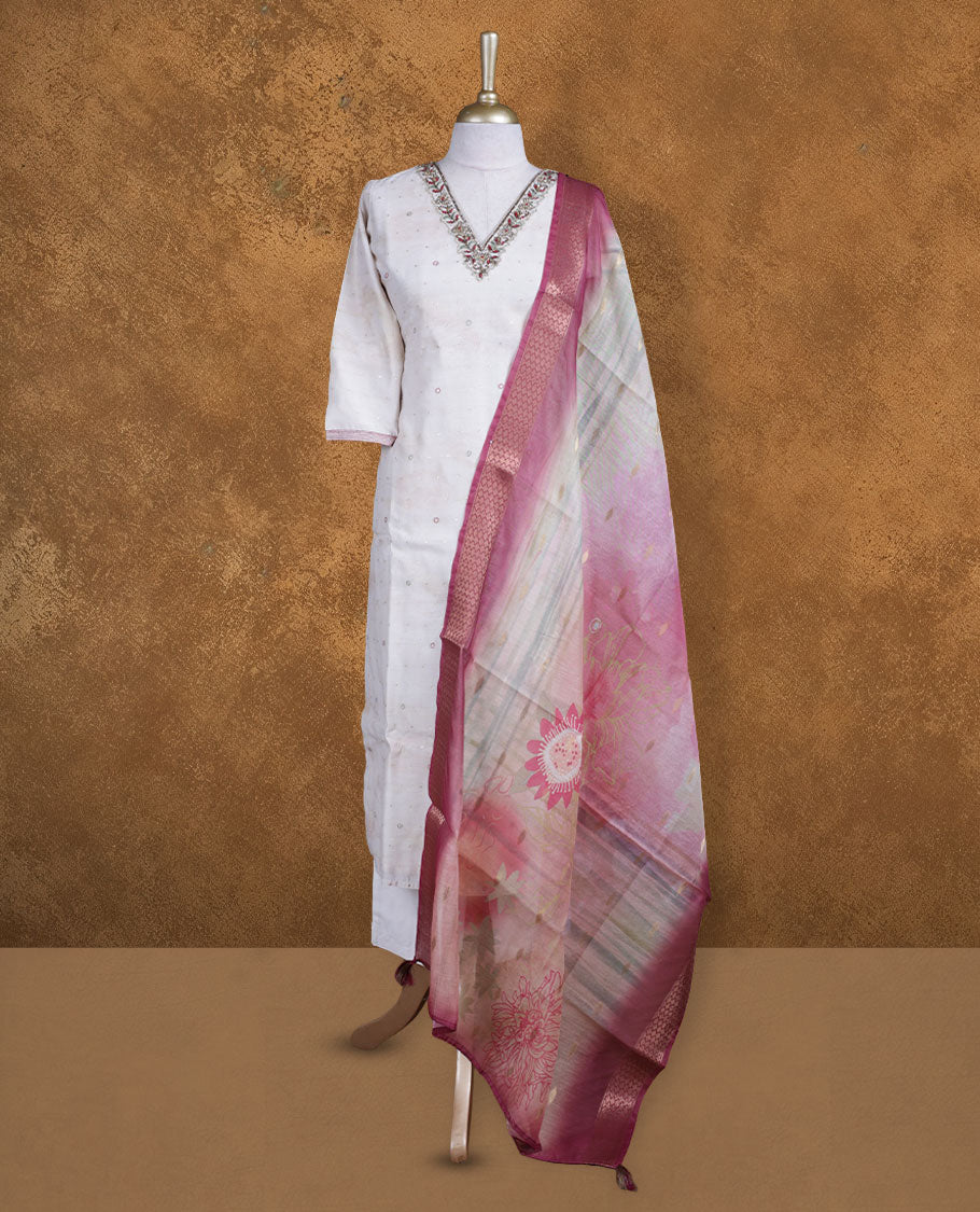 Ivory colour churidar set featuring thread and embroidered pattern neckline, sleeves, and thread embroidery motifs on body , Paired with a matching dupatta