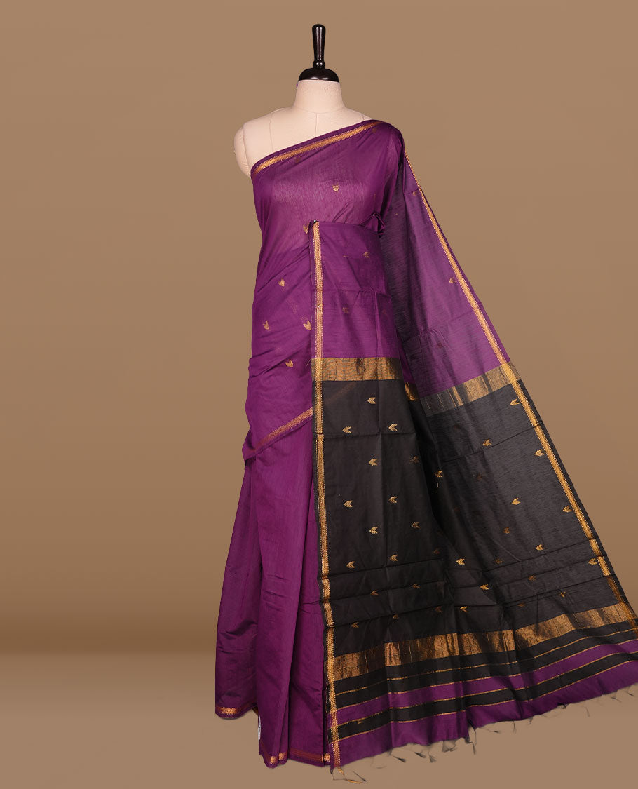 Purple colour Maheshwari cotton saree features elegant gold zari motifs across the body, a classic gold zari border, a striking contrast pallu, and a matching blouse piece.