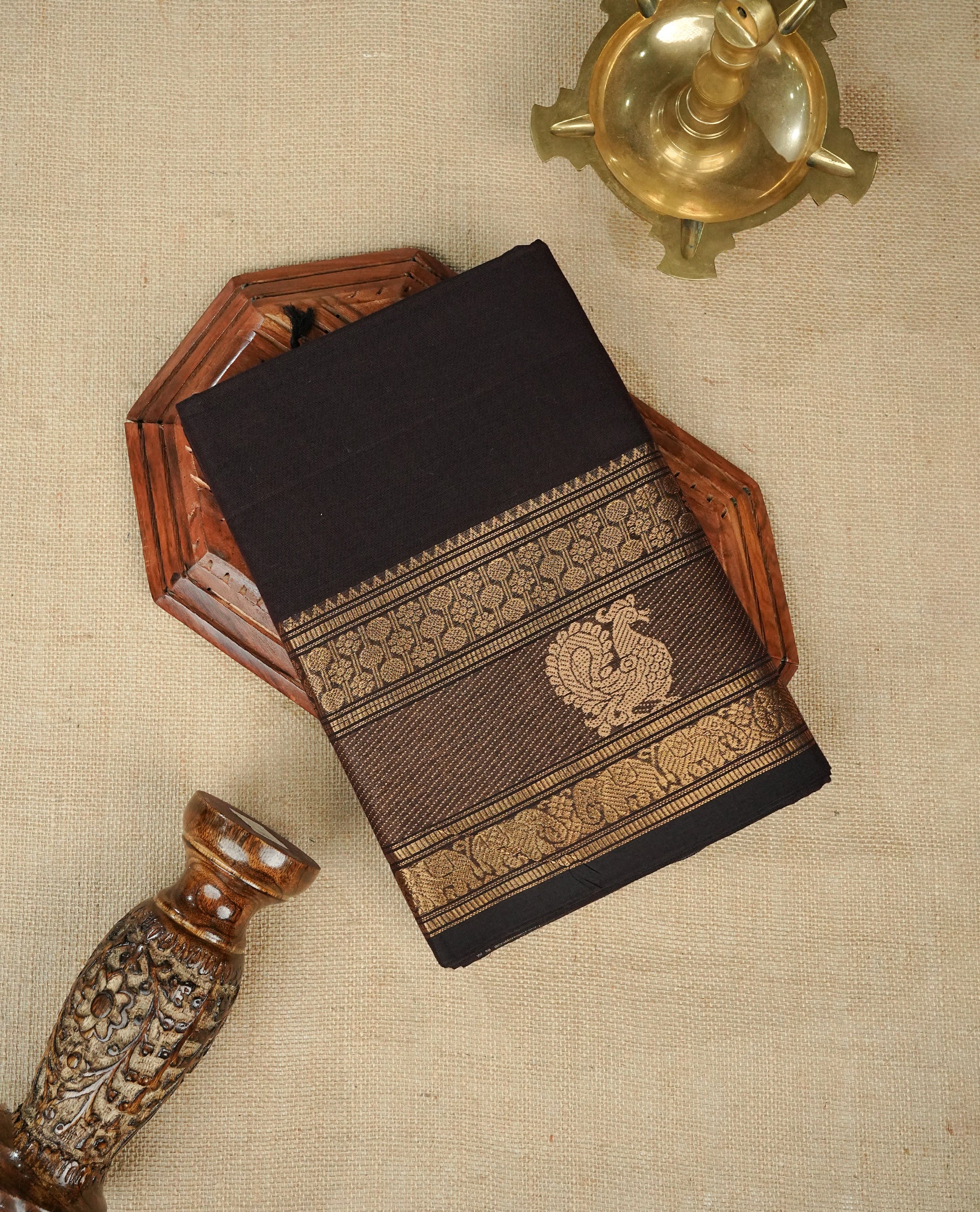 Dark chocolate Colour Chettinad Cotton Saree Featuring a Plain Body, Complemented by a Self Colour Border with Peacock Pattern Gold Zari, Paired with a Matching Blouse Piece.