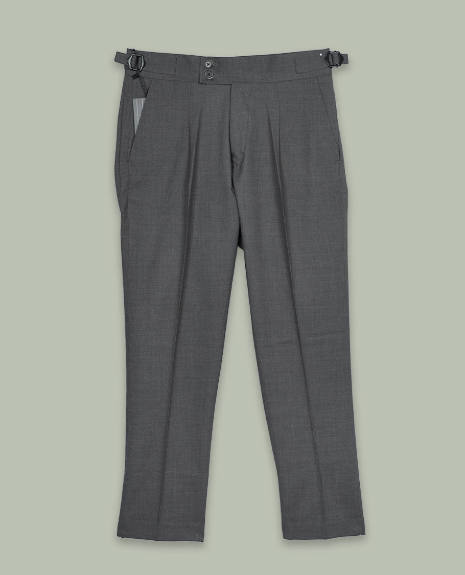 Charcoal grey colour men’s pant featuring a clean waistband with side buckle adjusters, neat front pleats, slant pockets and back welt pockets, finished with a straight leg fit.