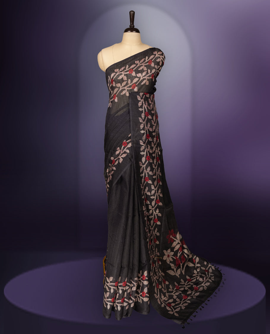 Navy blue colour saree with elegant beige & red colour leaf & flower work and subtle texture & Paired with a matching blouse, its perfect for festive events, receptions, or traditional gatherings with a touch of grace.