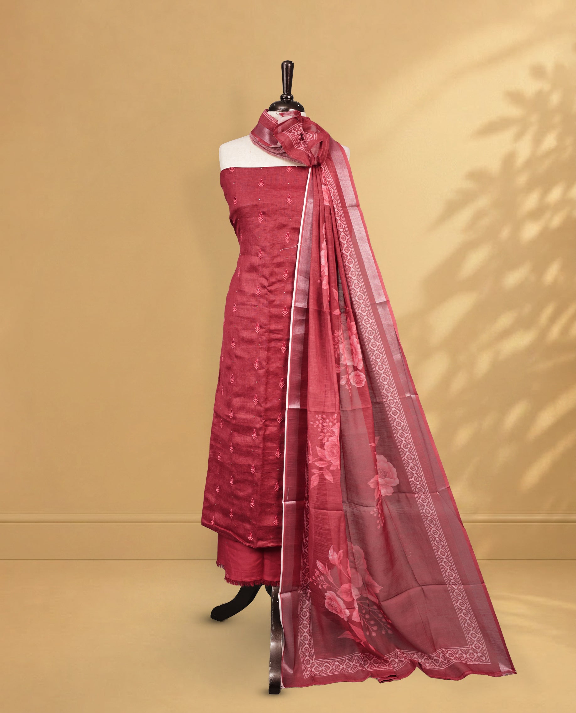 Maroon Colour Salwar material Featuring Embroidery work on body, paired with Matching Bottom and same Patterned Dupatta.