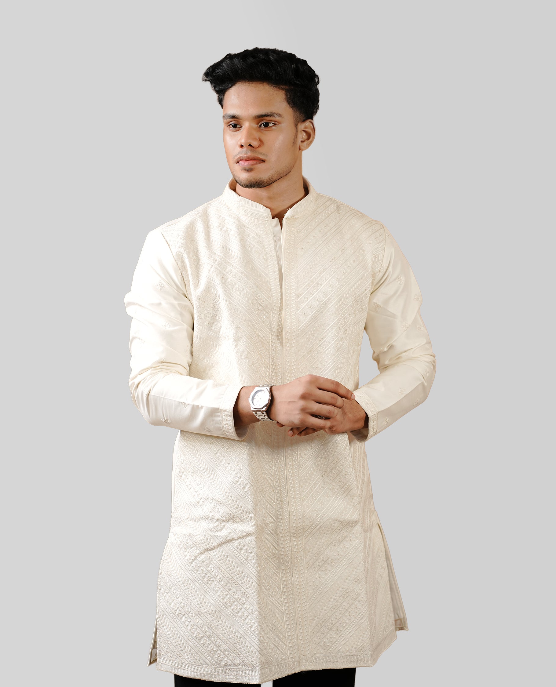 Beige colour men's kurta featuring elegant thread and sequins work on the body, complemented by full sleeves for a refined and festive look.