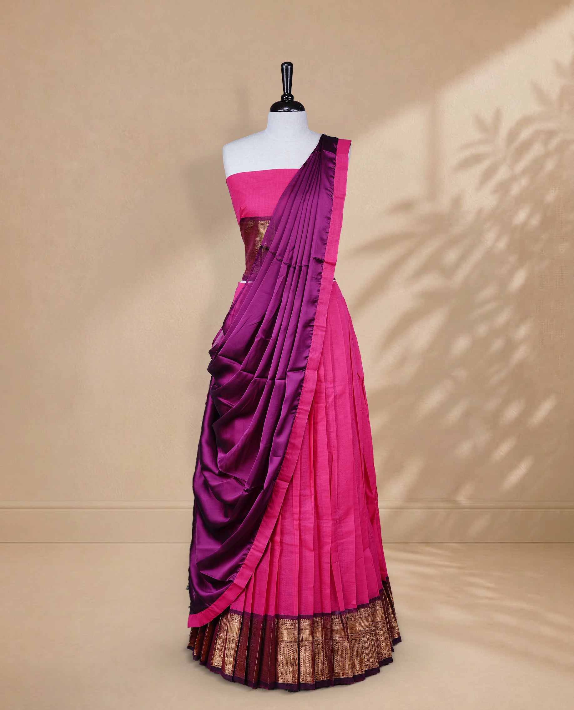 Olive green colour Half saree featuring Plain skirt with Zari border on contrast black colour border, Unstitched Blouse and matching dupatta.