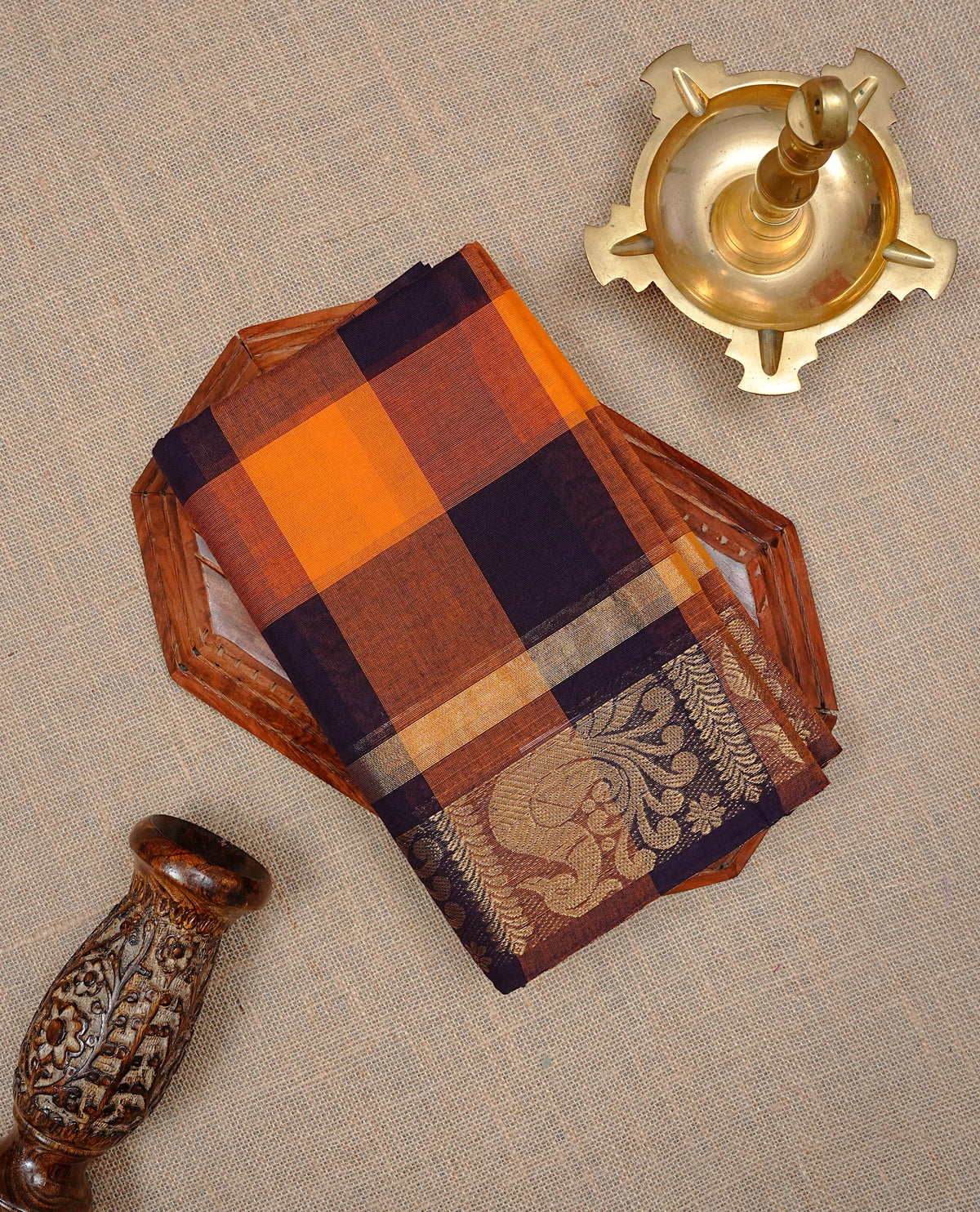 Dark Wine & Orange Colour Chettinad cotton saree featuring bold checked patterns across the body, complemented by a classic zari woven peacock motifs On border and matching checked pallu, paired with a matching blouse piece.