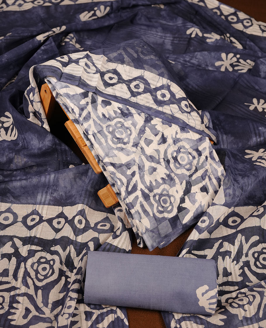 Blue colour churidar material featuring white floral printed body, paired with a matching chevron printed dupatta.