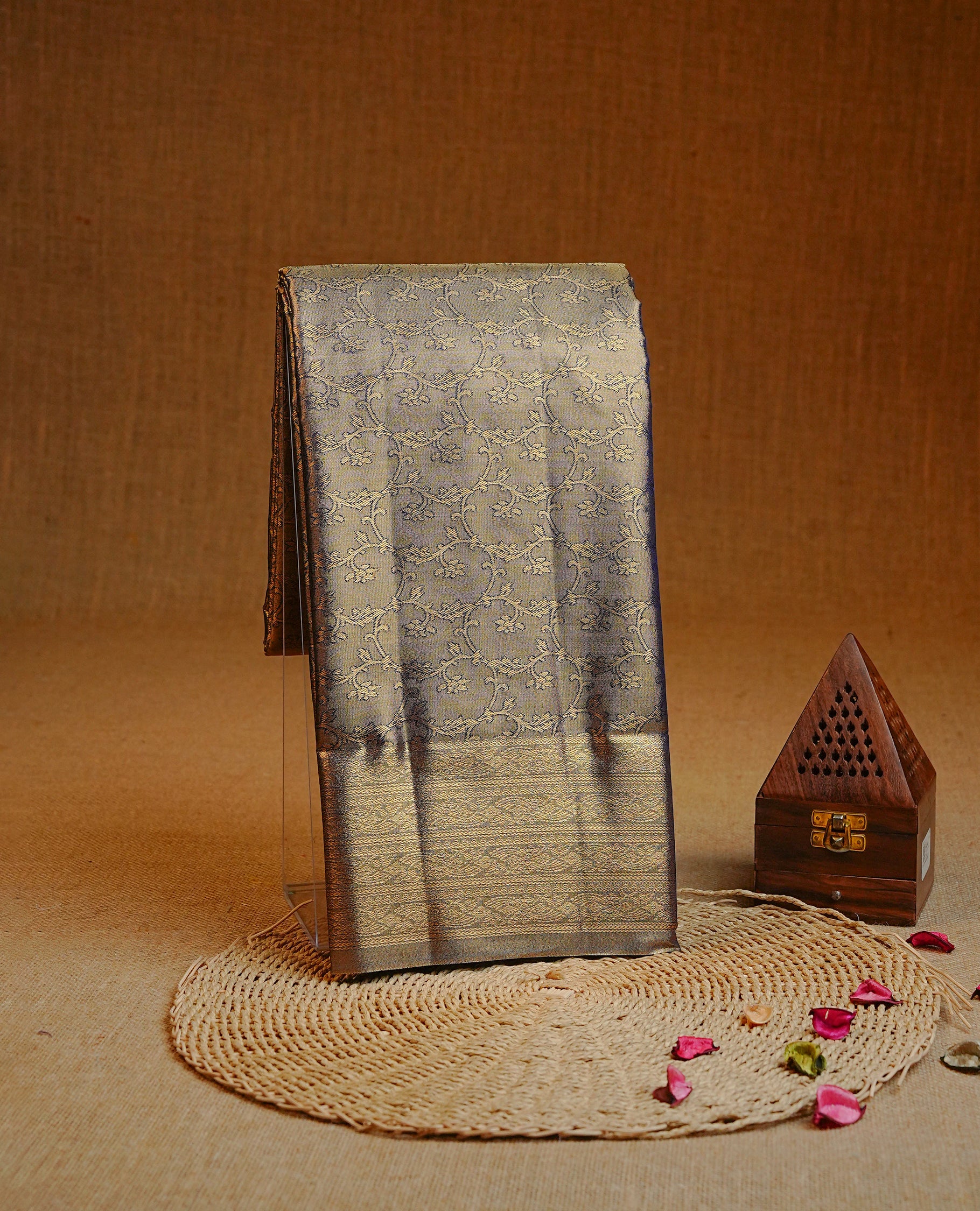 Gold & blue colour Double shade Semi tissue silk saree featuring Gold zari kodi pattern on body, self colour with traditional border, paired with matching.