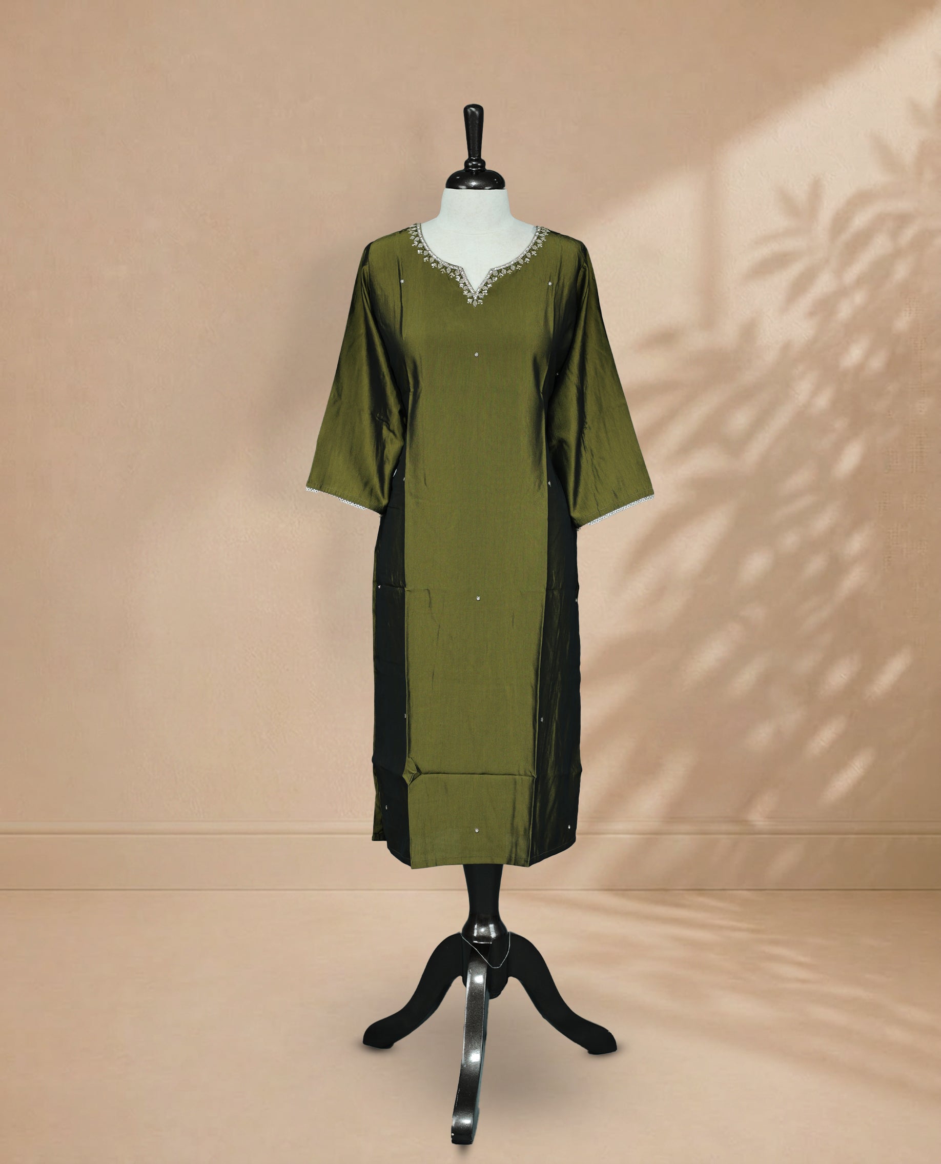 Olive Kurti featuring beadwork across the body, a V-shaped neckline adorned with bead and stonework, and a 3/4-sleeve design.