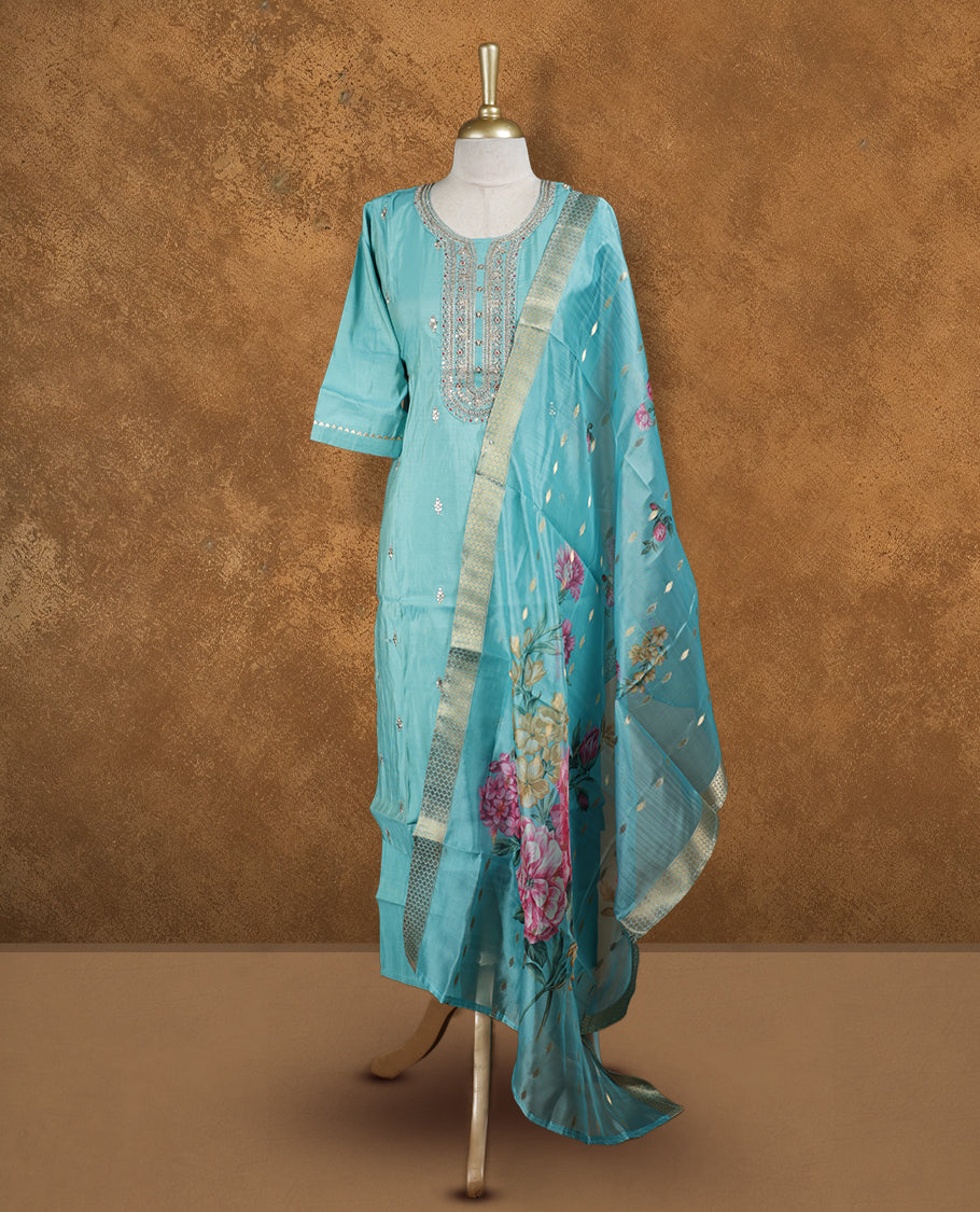 Aqua blue colour churidar set featuring thread and cut beats embroidered neckline, sleeves, and Gold colour motifs on body , Paired with a matching dupatta