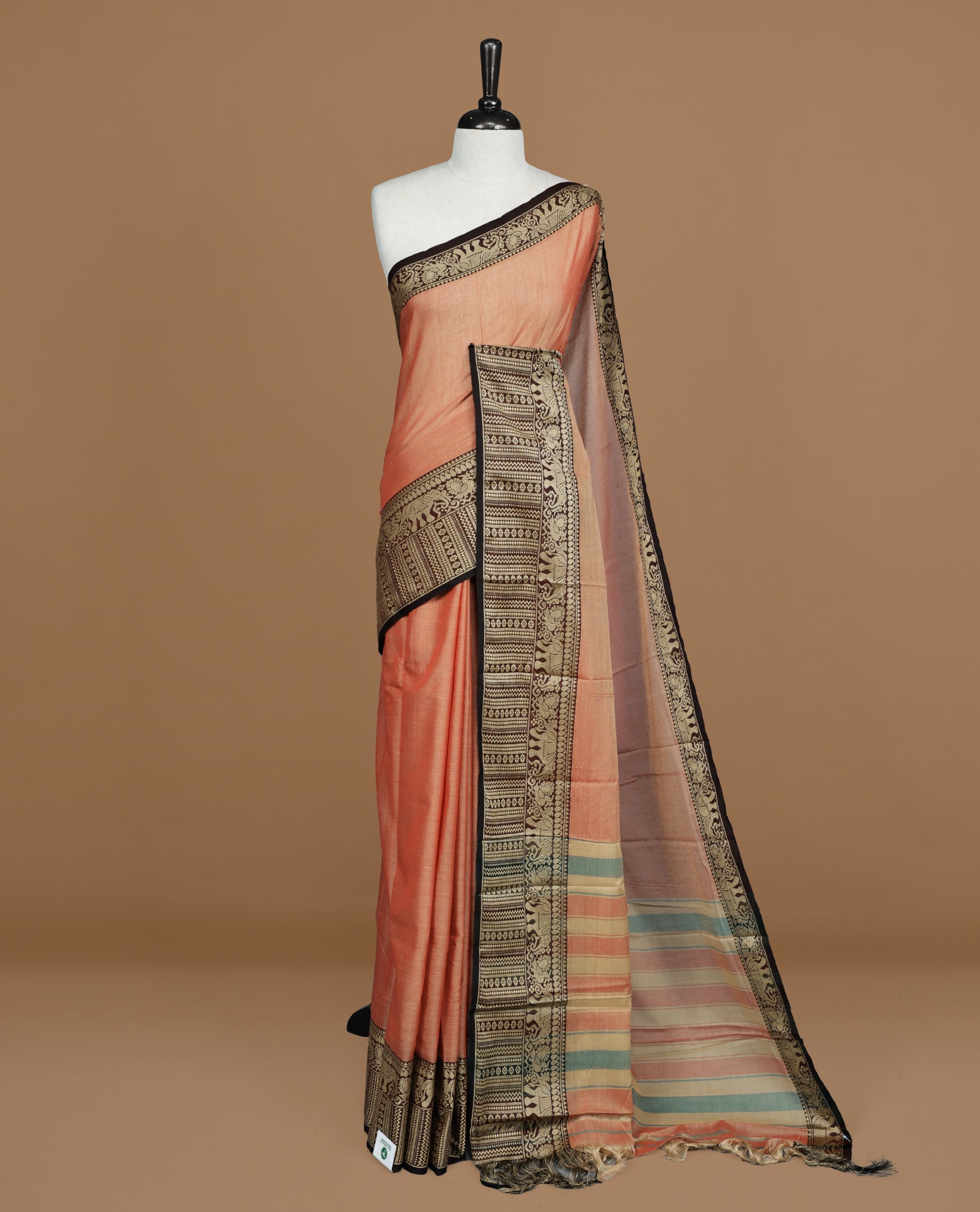 Peach colour Narayanapett cotton saree Featuring Elegant plain Body, complemented by Contrast Maroon colour with cream zari border, paired with matching blouse piece.