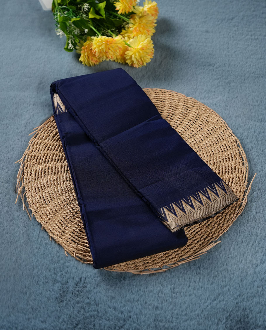 Navy blue colour Narayanapattu cotton saree featuring a self coloured body, contrast cream colour zari border and pallu, pairing a matching blouse piece.