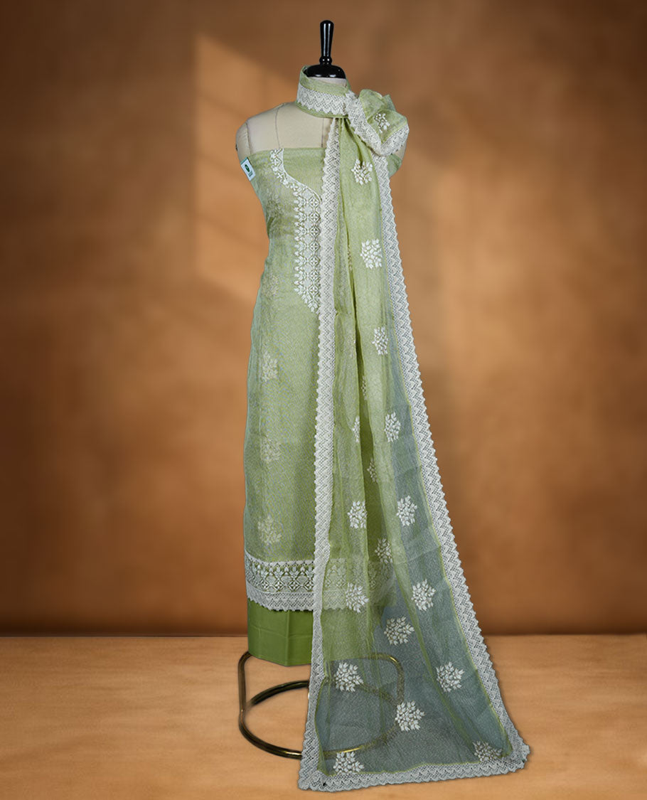 Pista green colour churidar set with off white thread embroidery and pearl detailing, paired with cotton matching pant and dupatta.