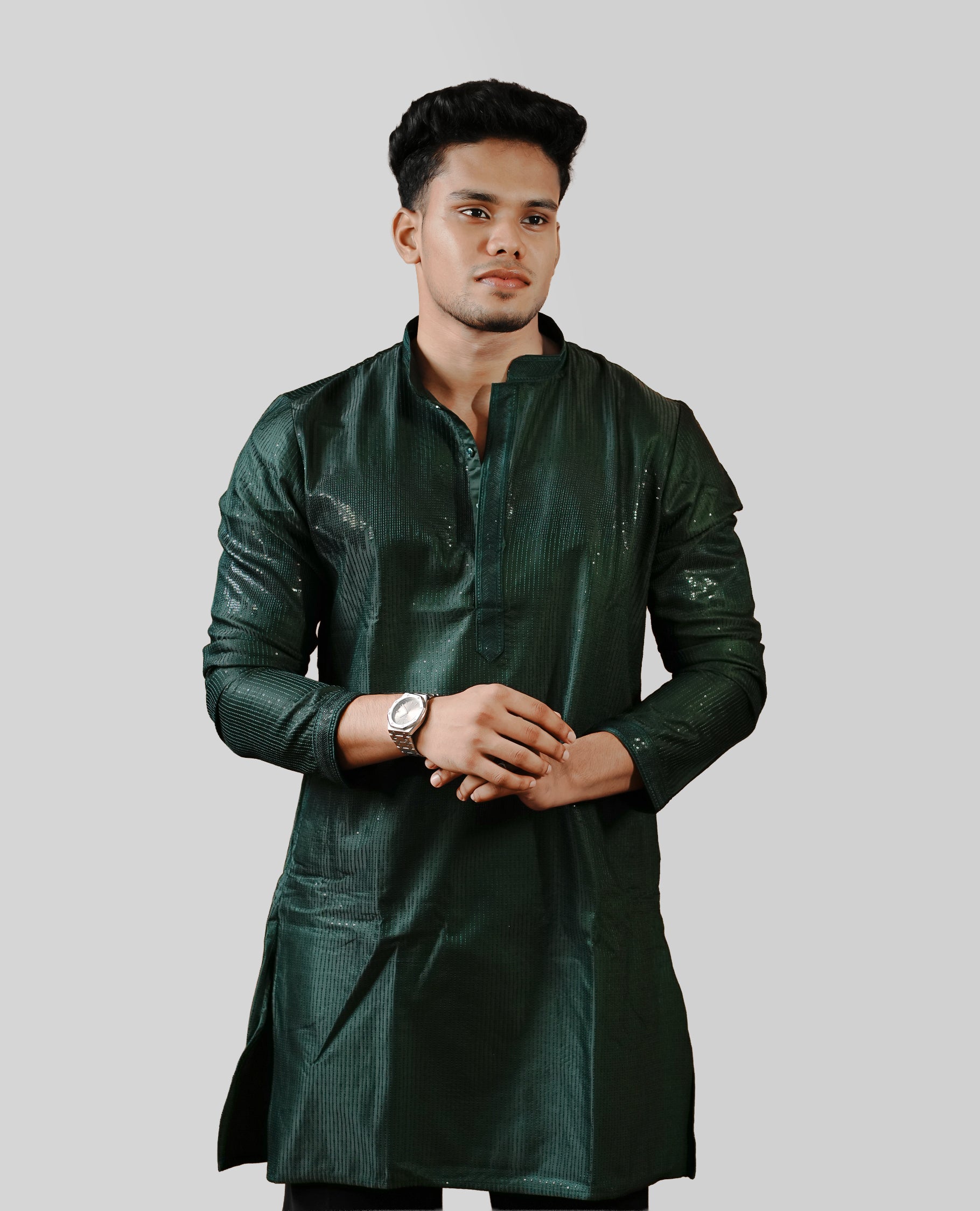 Dark Green colour men's kurta featuring elegant thread and sequins work on the body, complemented by full sleeves for a refined and festive look.