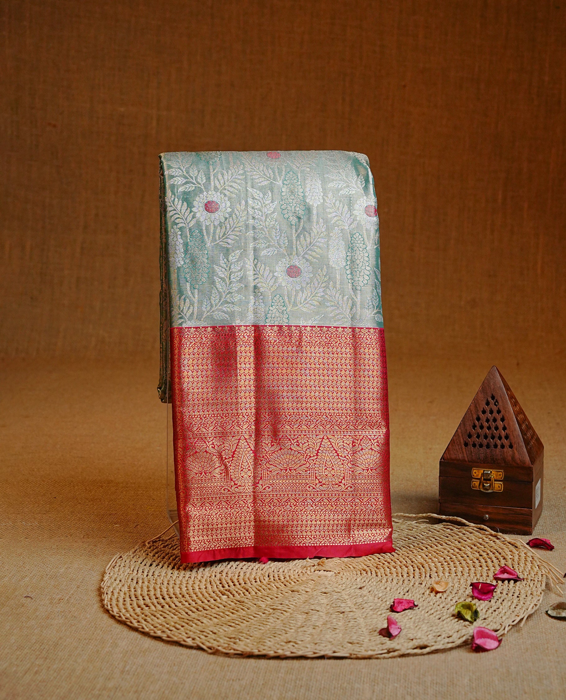 Light Green & gold colour Double shade Semi tissue silk saree featuring gold & silver floral pattern on body, Contrast Red colour with traditional border, paired with matching.