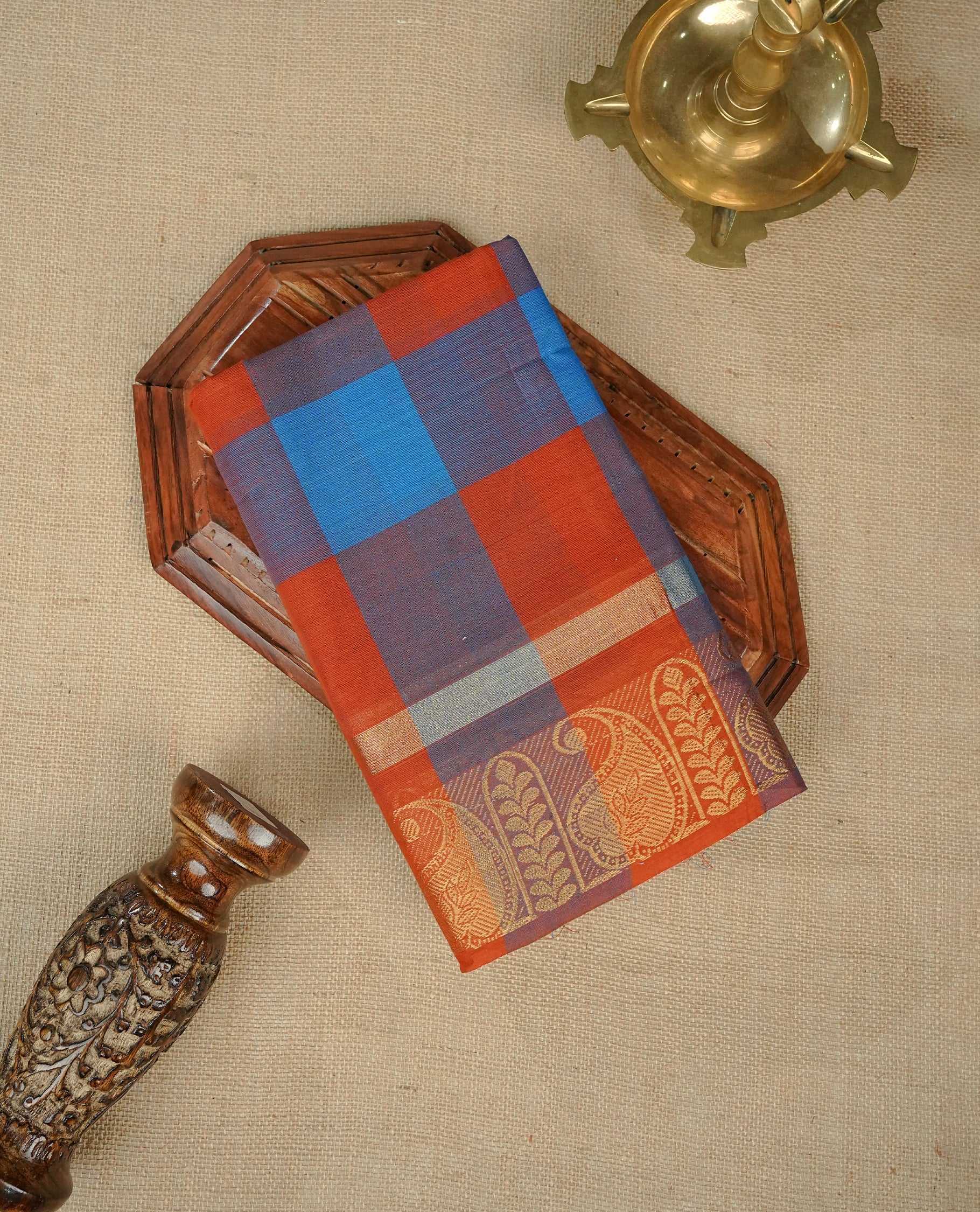 Rust orange & Blue colour chettinad cotton saree featuring check pattern on body, complemented by Self Colour with gold zari border, comes with matching blouse piece.