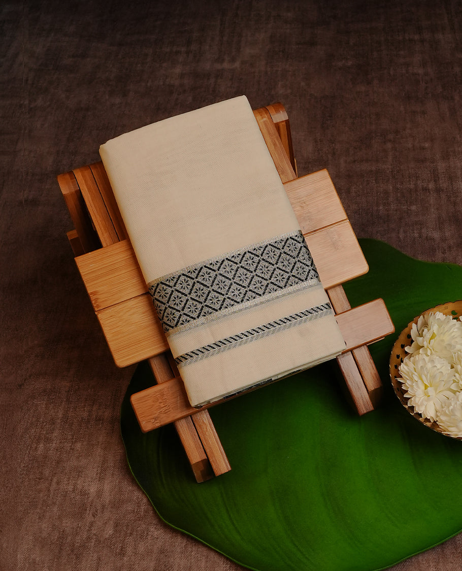 Cream colour cotton double dhoti with plain with Black & silver Zari designed border
