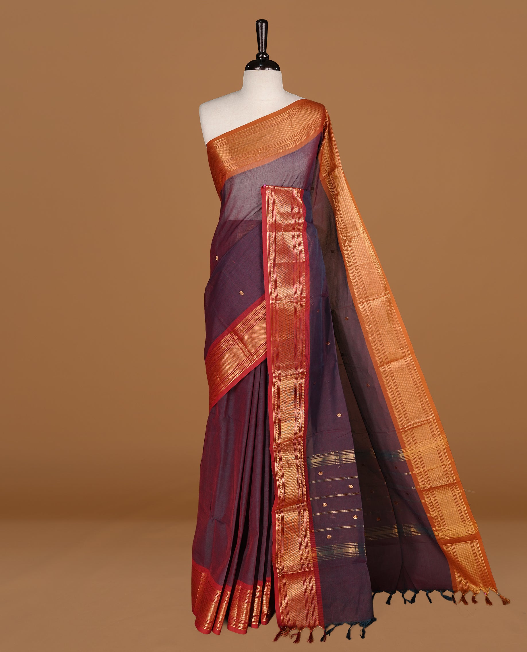 Teal & maroon colour Chettinad cotton saree featuring gold zari motifs body, complemented by contrast Maroon colour with gold zari border, paired with matching blouse piece.