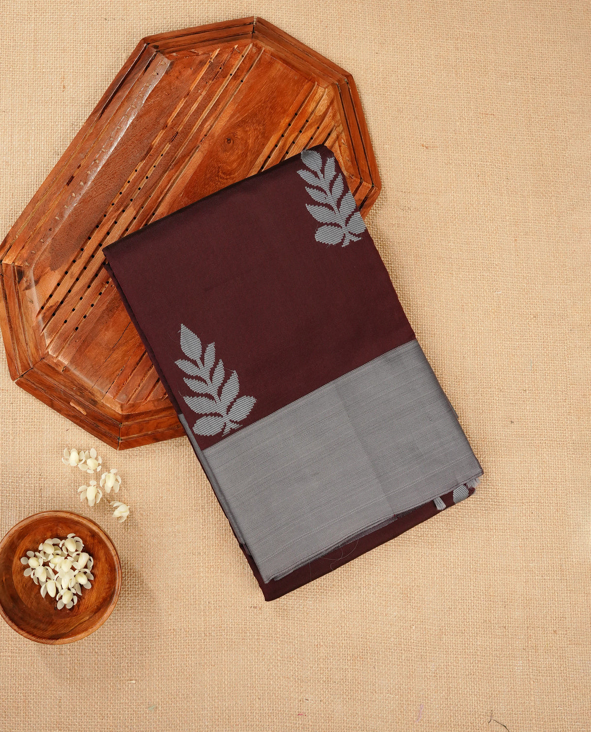 Dark brown colour silk cotton saree featuring ash colour thread motifs on body thread detiled contrast borders & pallu,comes with matching blouse piece