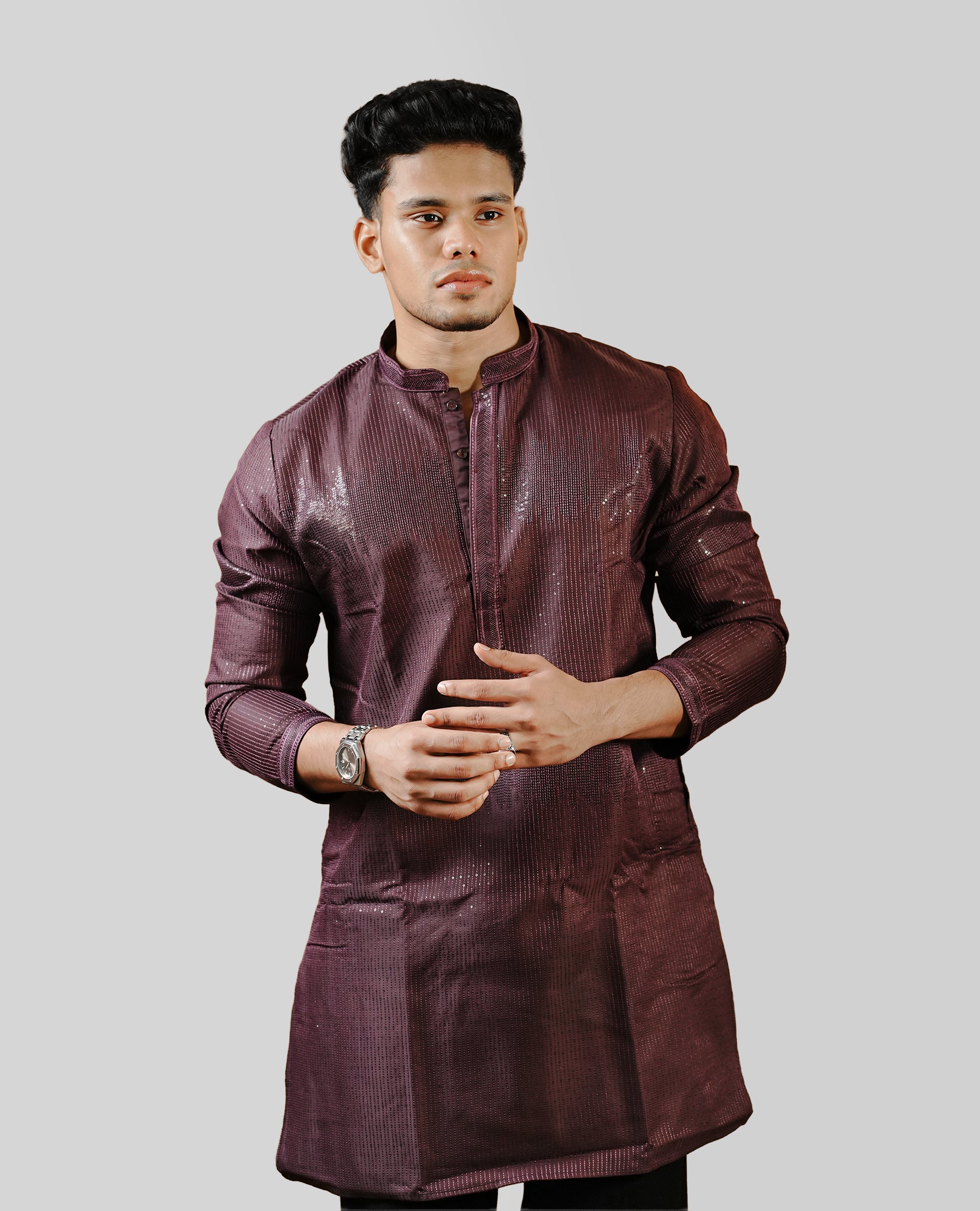 BlackBerry colour men's kurta featuring elegant thread and sequins work on the body, complemented by full sleeves for a refined and festive look.