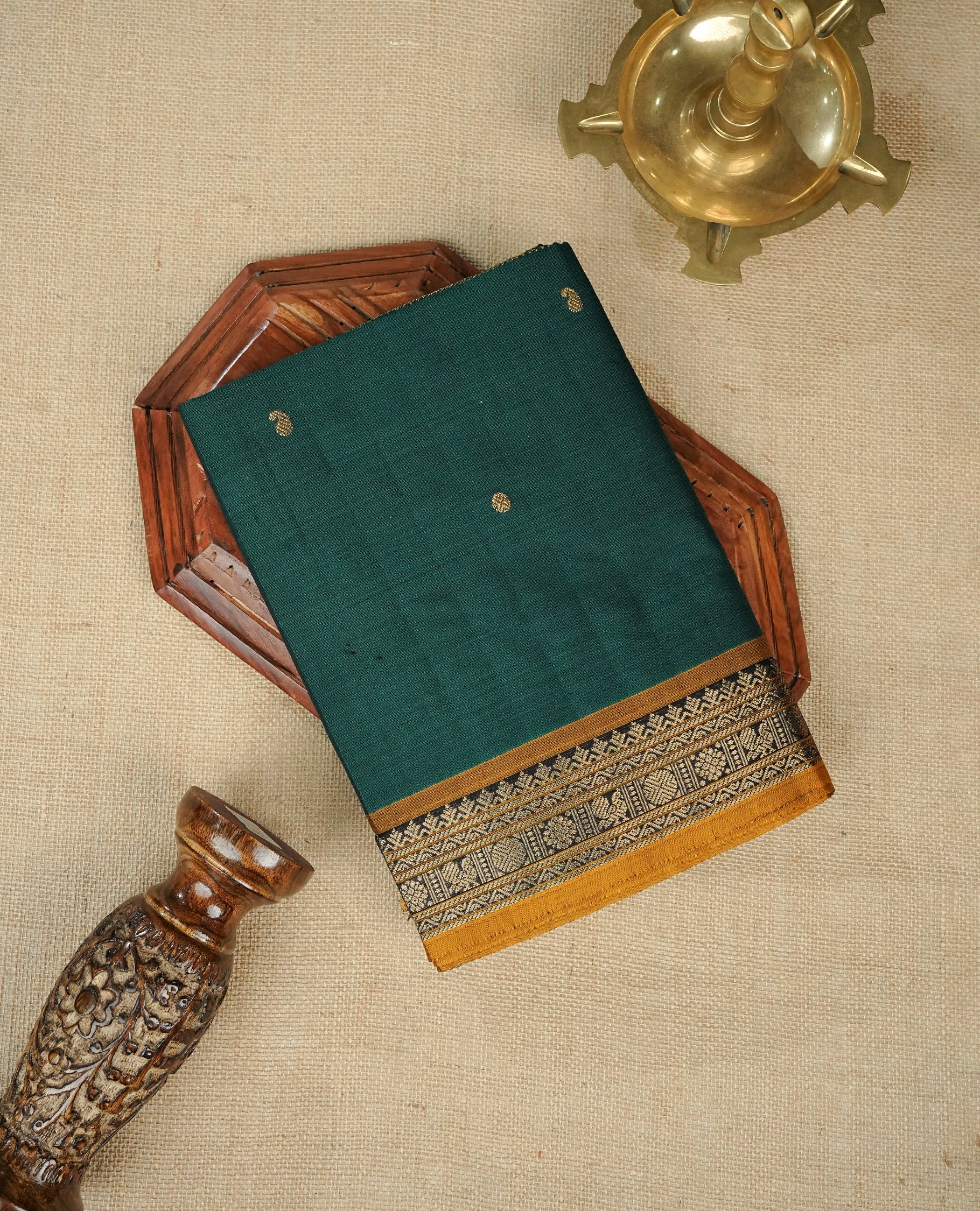 Green colour chettinad cotton saree featuring gold zari motifs body, Contrast Mustard colour with Gold zari border, comes with matching blouse piece.