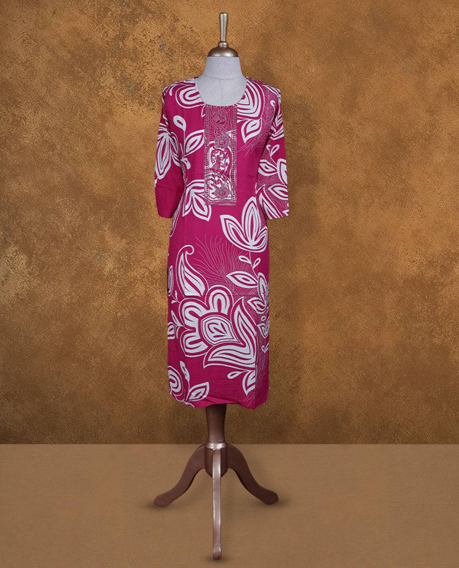 Pink colour kurti with white floral prints, knee length design, styled with a round neckline and a sleeve .