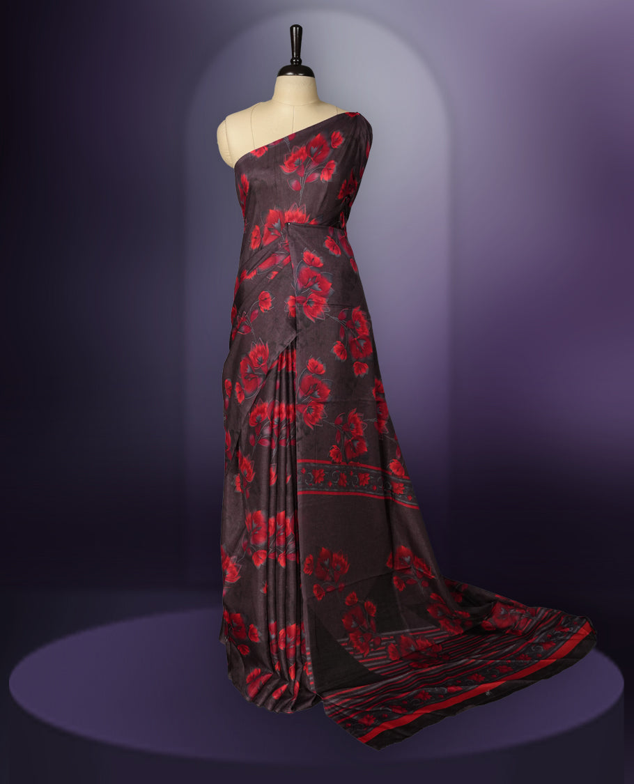 Deep brown colour saree enhanced with a vibrant red colour floral prints on body & pallu, and comes with a matching blouse.
