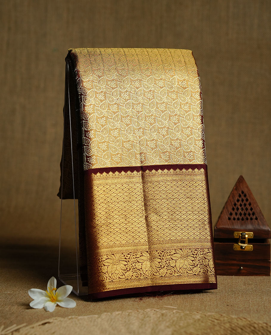 Gold & chocolate double shade colour kancheepuram tissue silk saree featuring gold zari floral kodi pattern on body, complemented by contrast maroon colour with traditional border, paired with matching blouse piece.