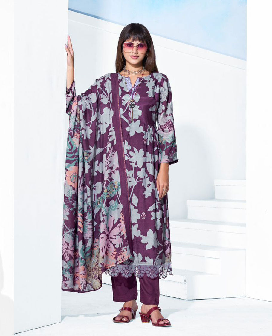 Purple colour pure muslin suit set featuring purple grey colour digital floral printed top featuring sequin butti embroidery and a scalloped floral embroidered border, paired with a dyed pure viscose muslin bottom and a digital printed dupatta.