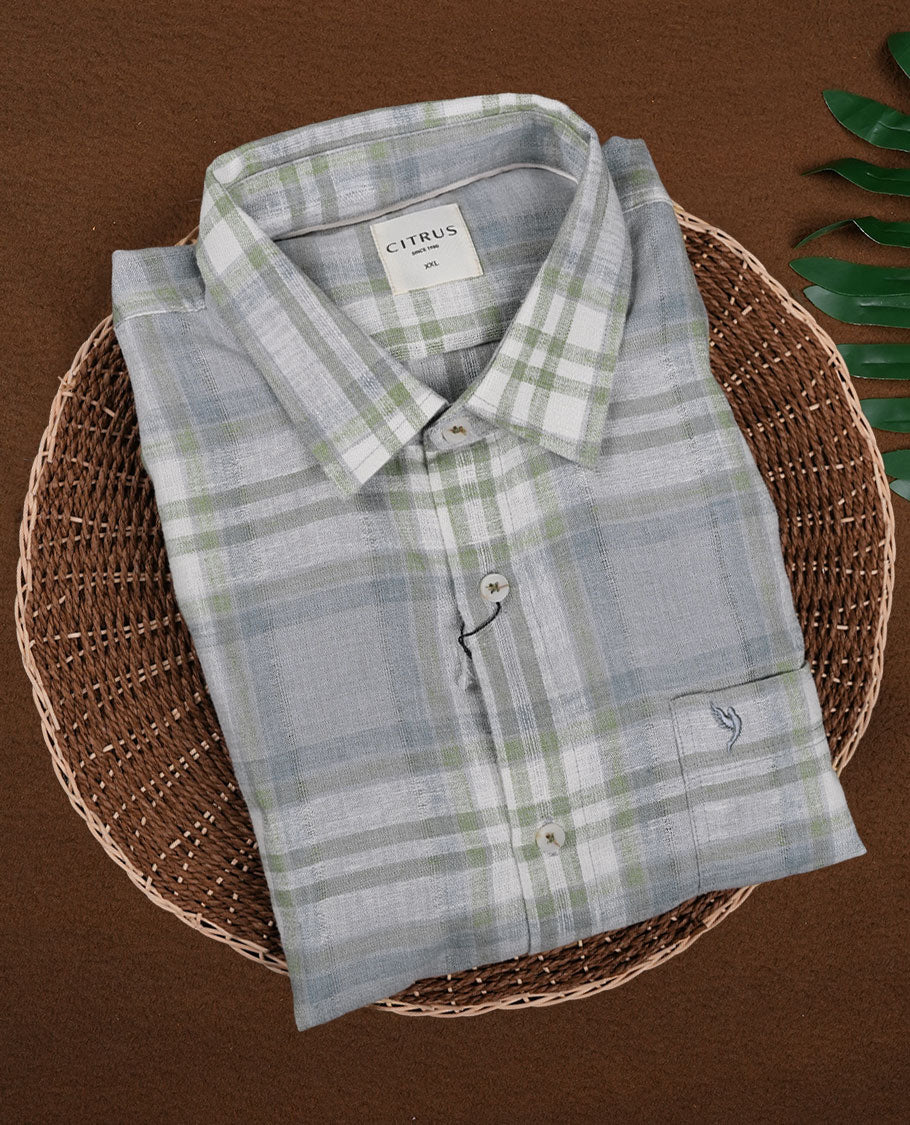Blue & Green colour checked cotton shirt featuring soft white highlights, a classic collar, and full sleeves, Perfect for a smart-casual look that balances comfort and timeless style.