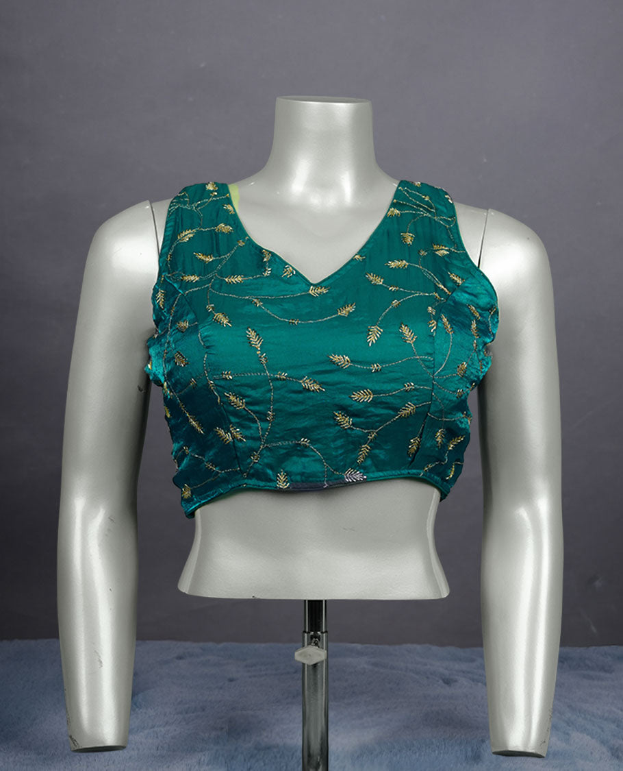 Teal colour embroidered padded blouse with gold vine detailing, V neckline, and tie-back finish.