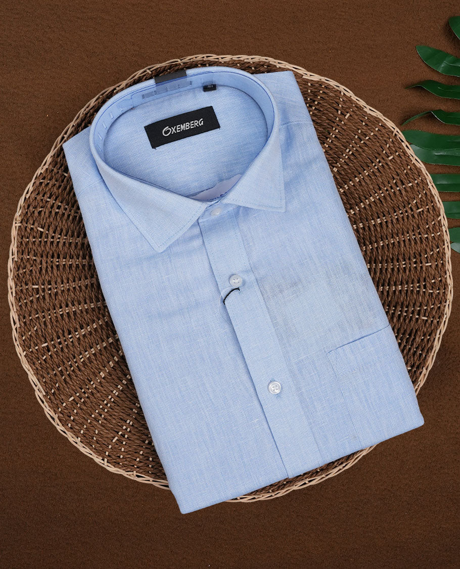 Sky blue Pcolour men's formal shirt, crafted with a soft textured finish featuring full sleeves, classic collar, and chest pocket ideal for office and semi formal occasions