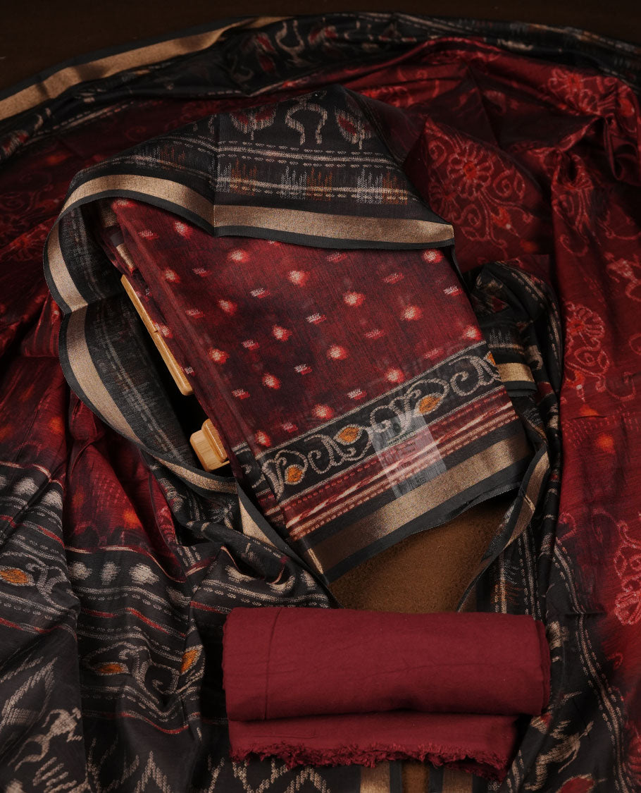 Dark Maroon colour churidar material featuring a subtle dotted printed body, paired with an intricately printed maroon dupatta.