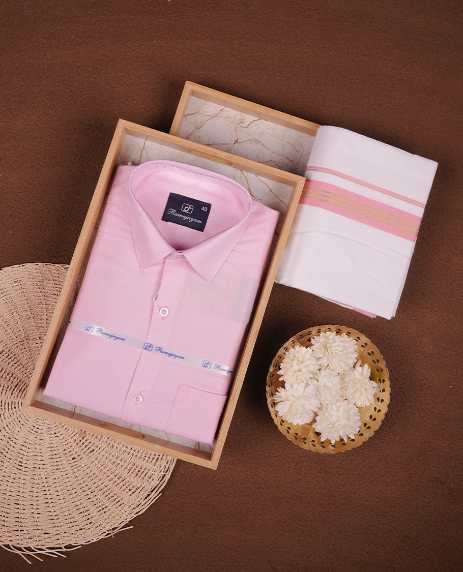 Light Pink Colour shirt paired with a matching dhoti, finished with a peach and gold border.